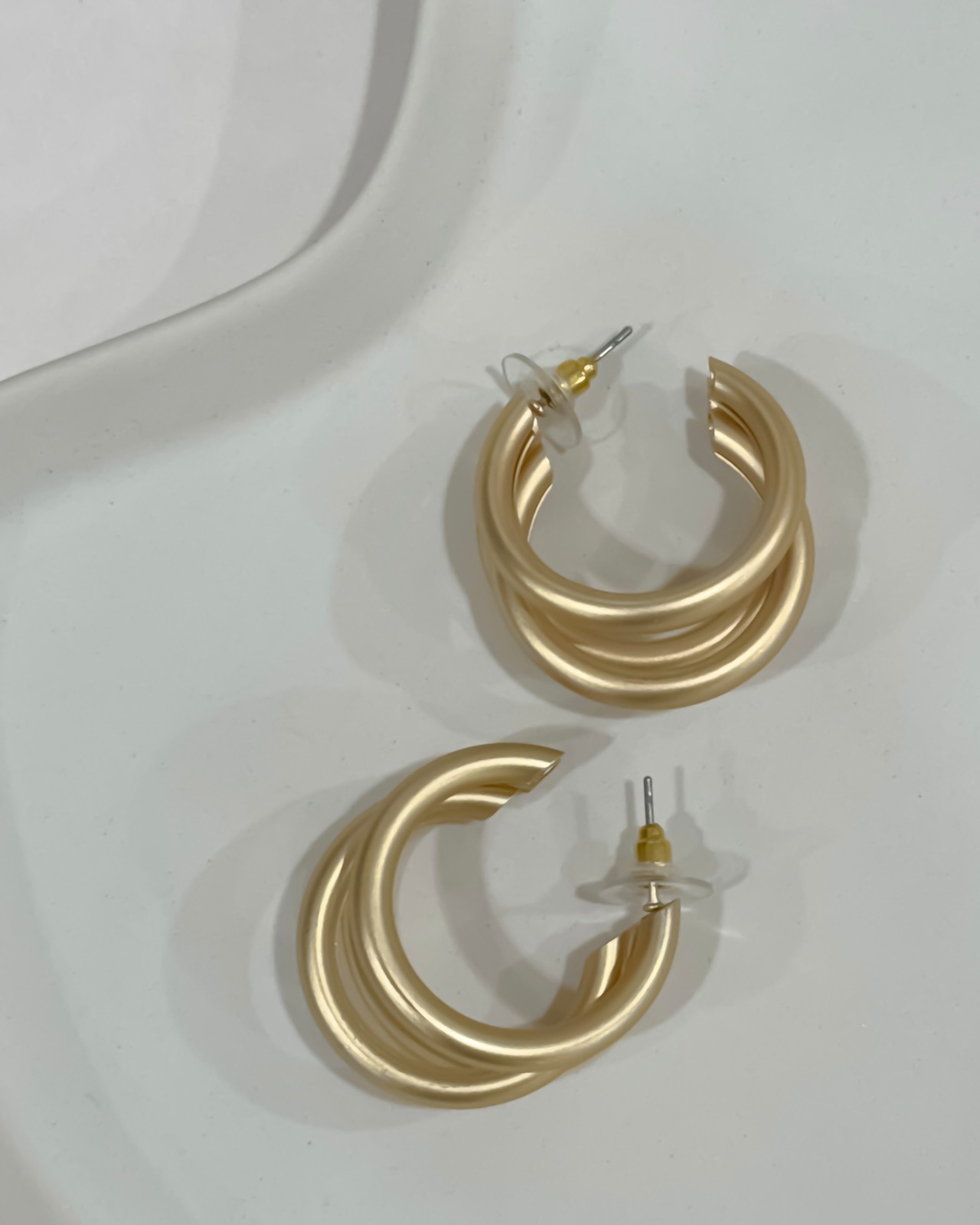 large triple hoop pierce