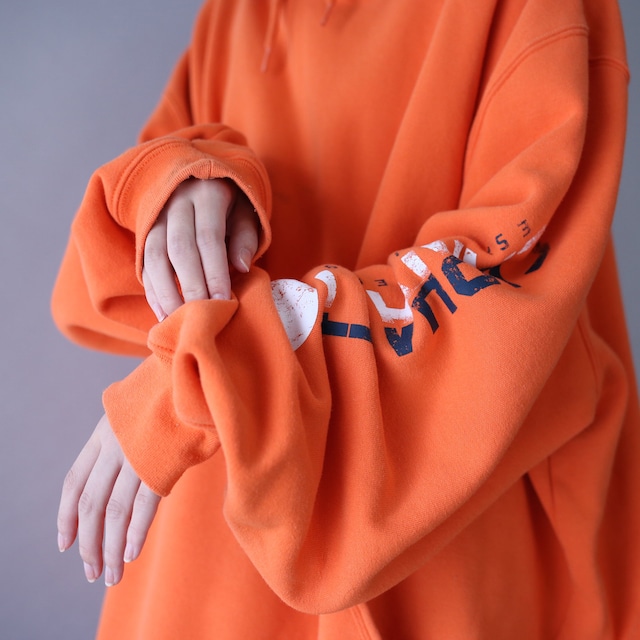 "Carhartt" sleeve logo printed XXXL over silhouette orange sweat parka