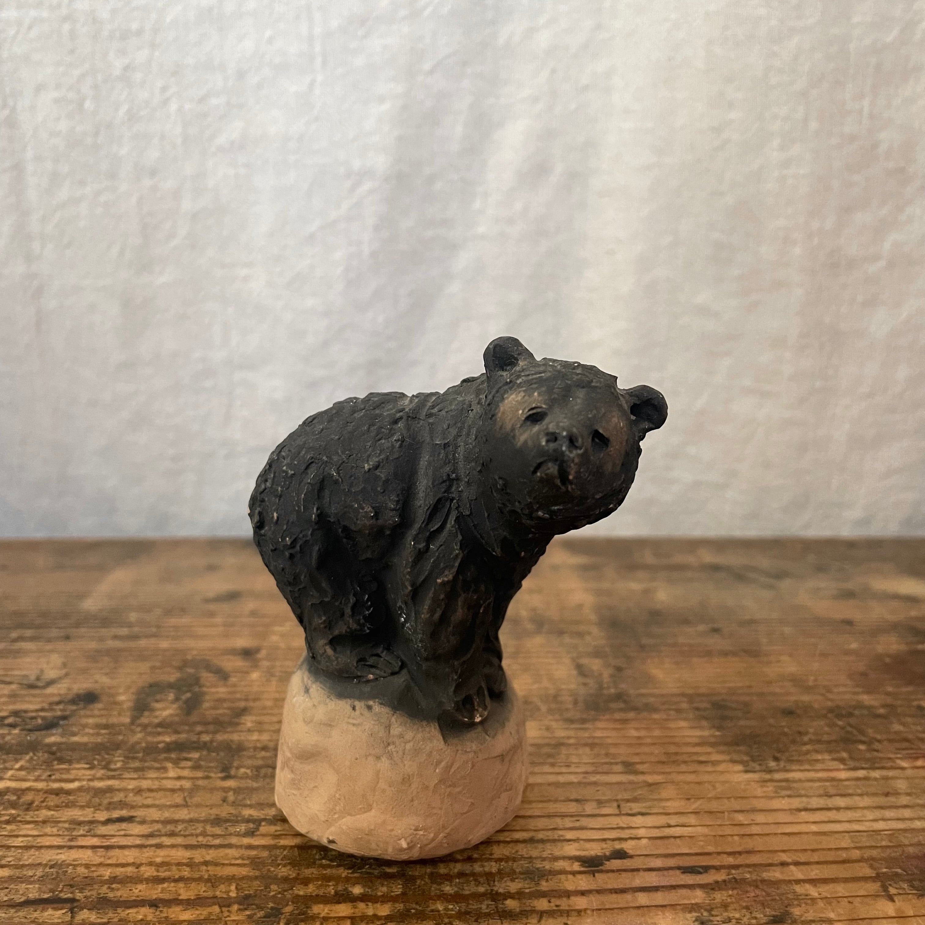 さみしい顔のくま