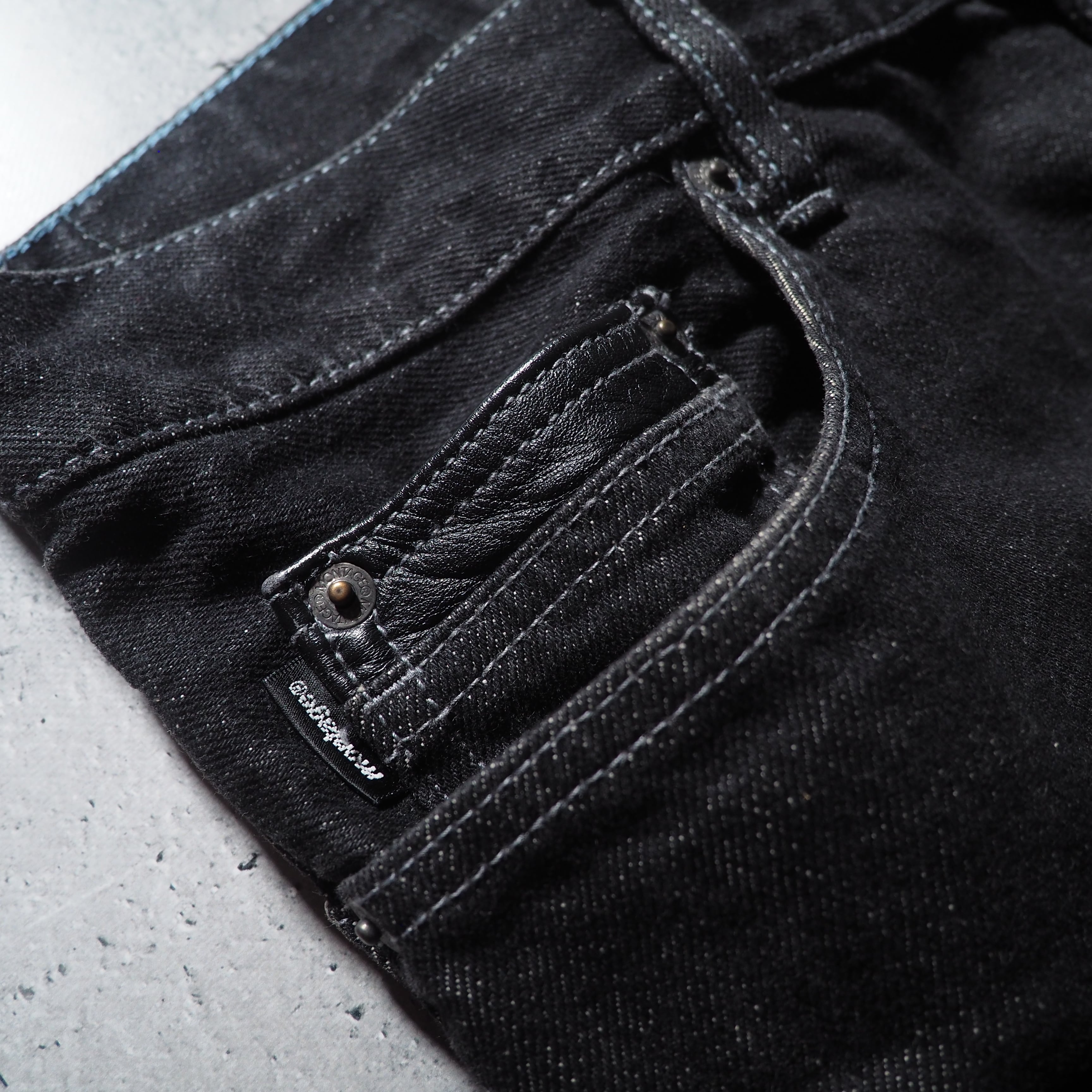 ” Montage ” Back logo painted Black loose Buggy Denim pants