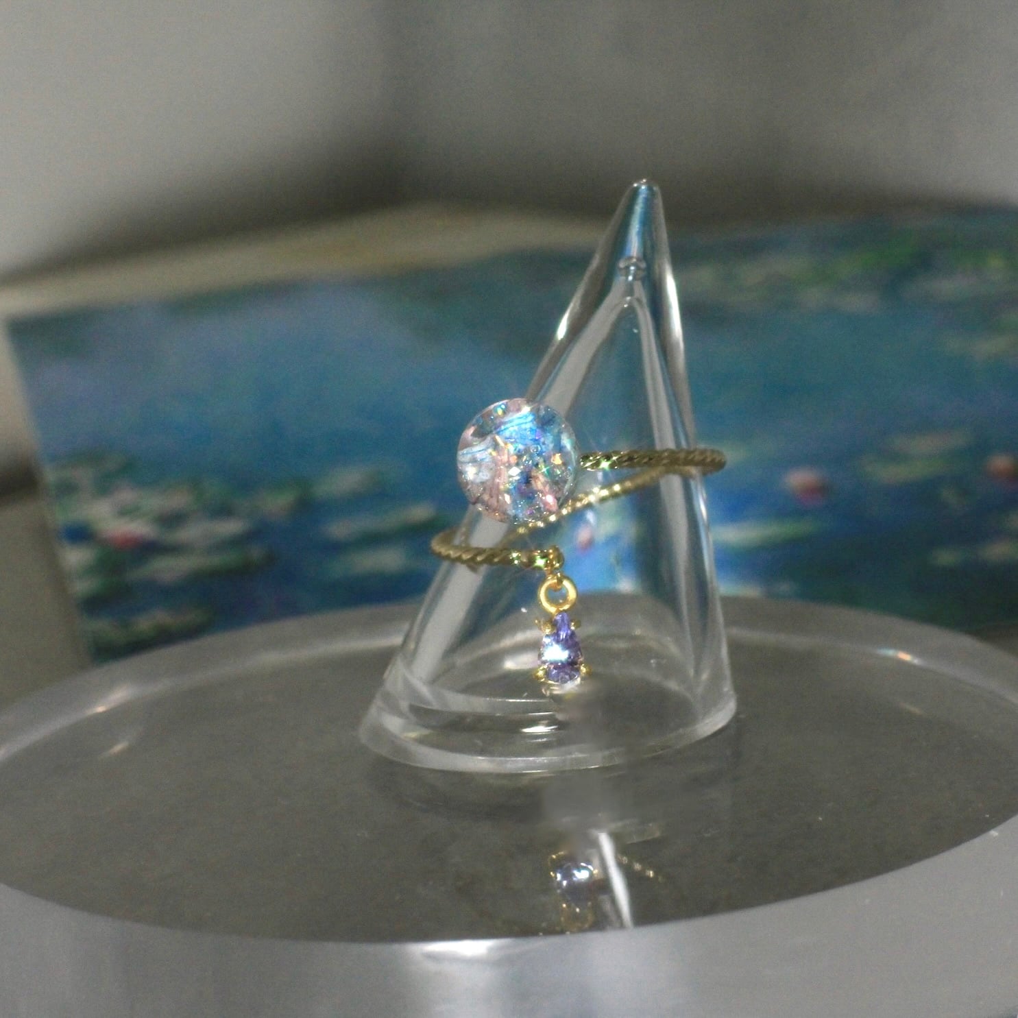 タンザナイト揺れる Lumière ring - mètèore モネ『睡蓮』を纏うリング