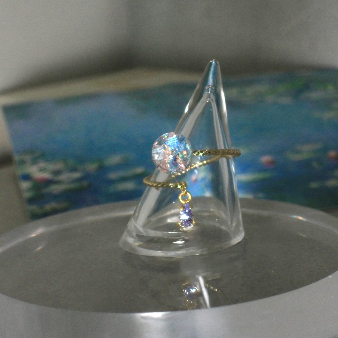 タンザナイト揺れる Lumière ring - mètèore モネ『睡蓮』を纏うリング 【受注制作】サージカルステンレス