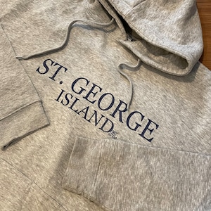 【PACIFIC&CO】セント・ジョージ島 st george island スウェット パーカー フーディー プリント ロゴ  L US古着