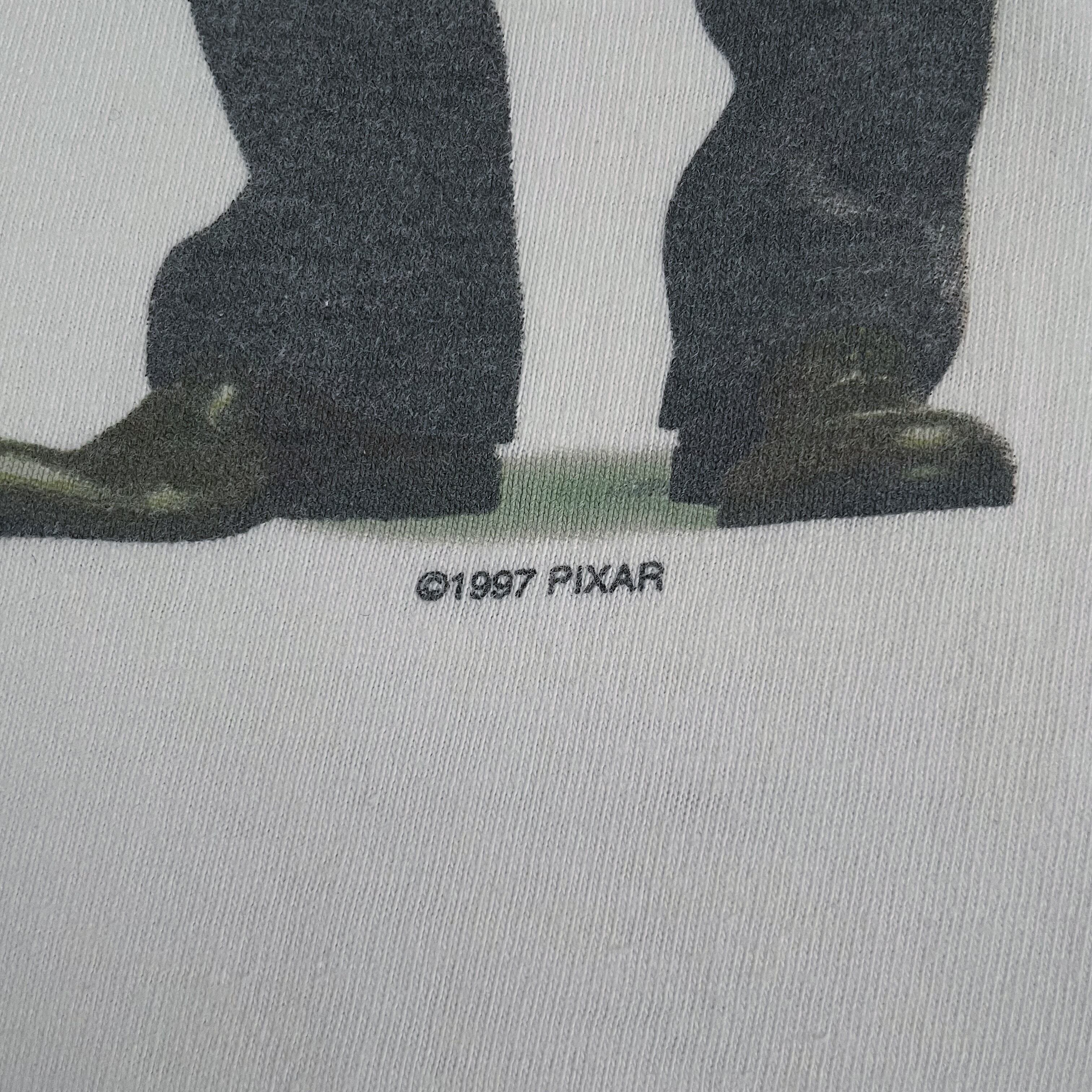 90s ウッディお直しおじさん L/S “Pixar” | Pay ID