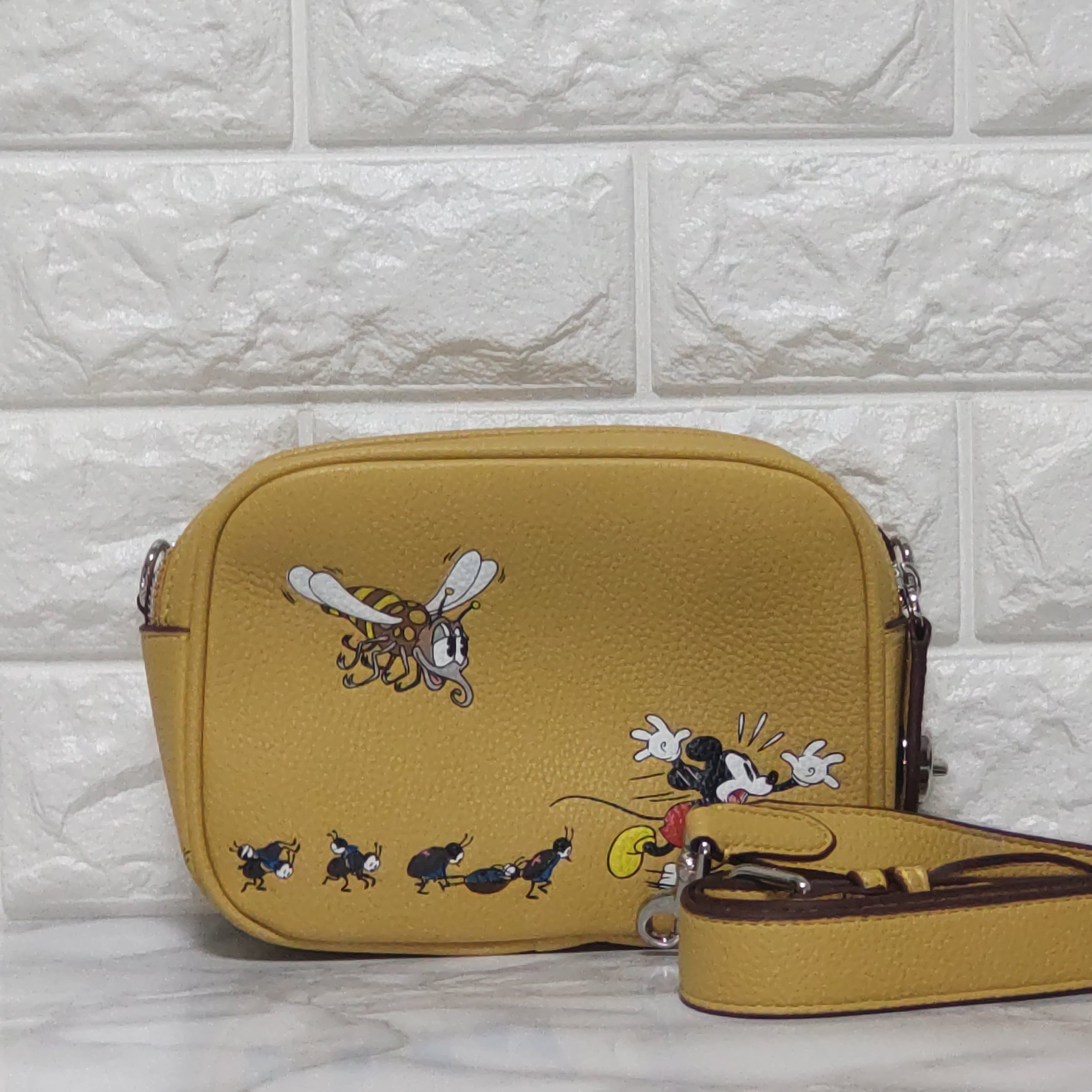 新品DISNEY X COACHフライト バッグ 19・リジェネラティブ レザー