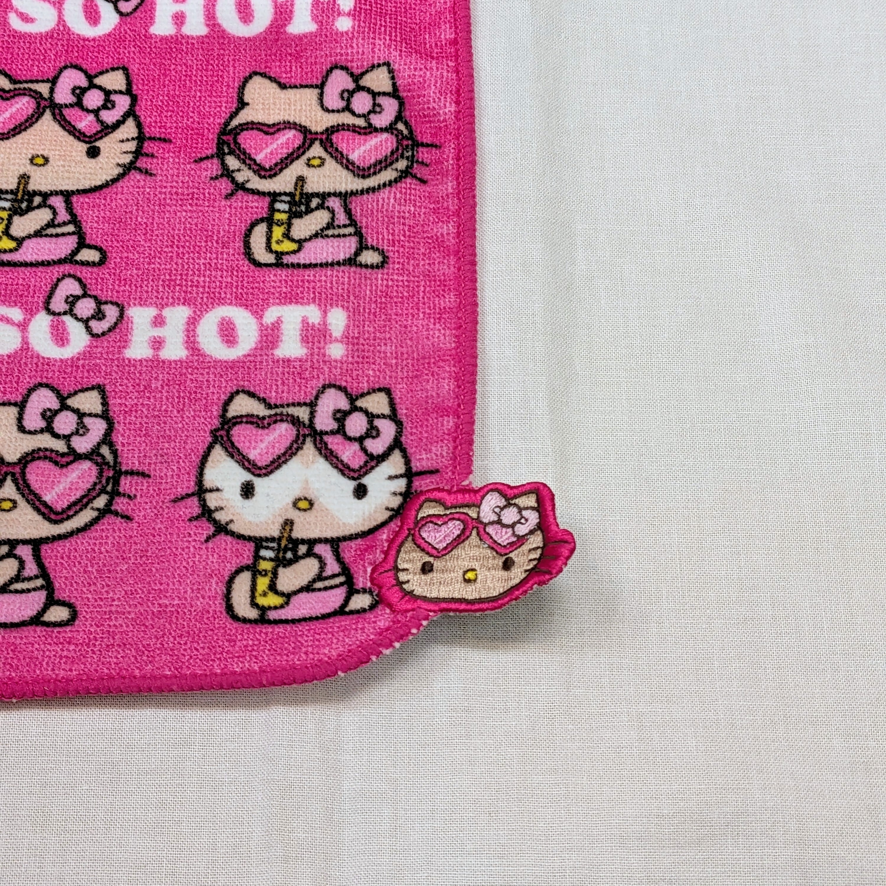 日焼けキティ刺繍ミニタオル | 沖縄のおみやげ屋 海島