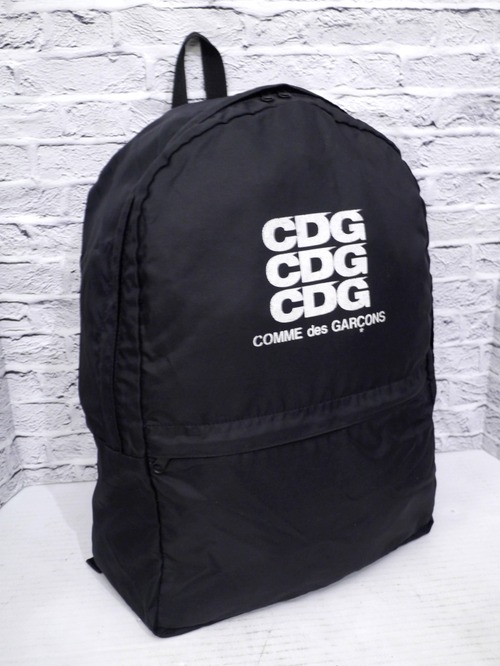 【定番】COMME des GARCONS コムデギャルソン 大容量 ユニセックス ロゴデザイン ナイロン バックパック リュックサック デイパック 黒x白