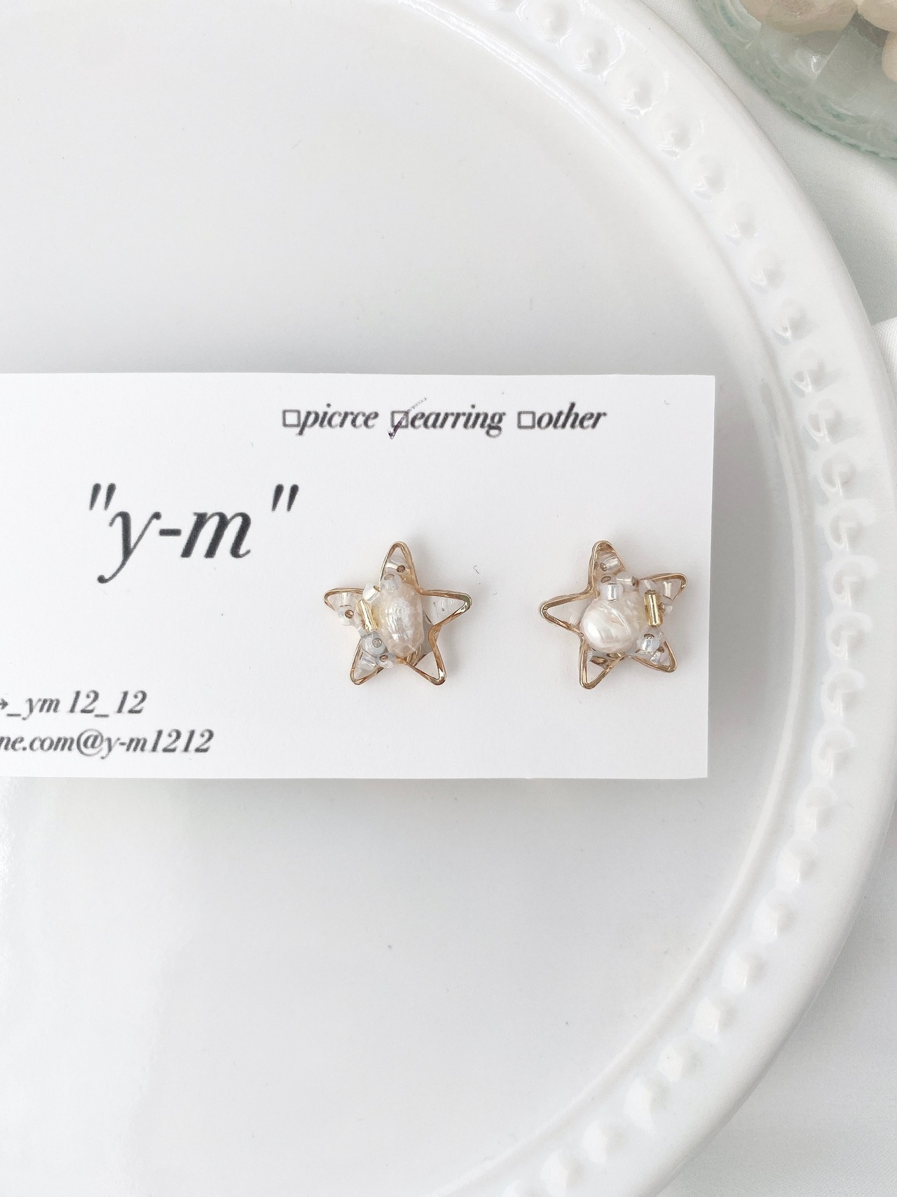 小さな星と淡水パール…/y-m-上品なハンドメイドピアス