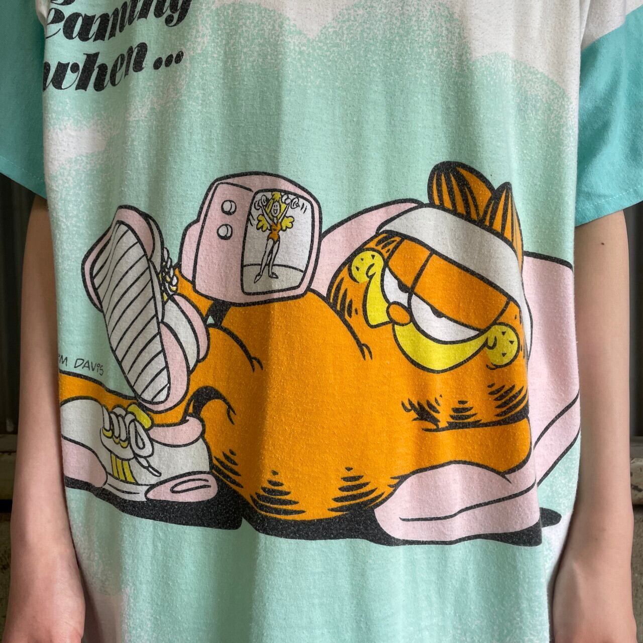 80年代 GARFIELD ガーフィールド リンガー キャラクタープリント ロングTシャツ レディースXL相当 古着 80s ビンテージ ヴィンテージ  染み込みプリント 大判プリント ロング丈 ホワイト×ライトブルー【Tシャツ】【PS2307T】【SS2308-2】 | cave