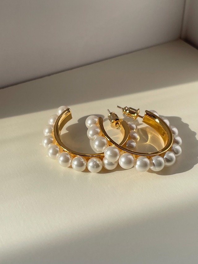 Pearl hoop pierce
