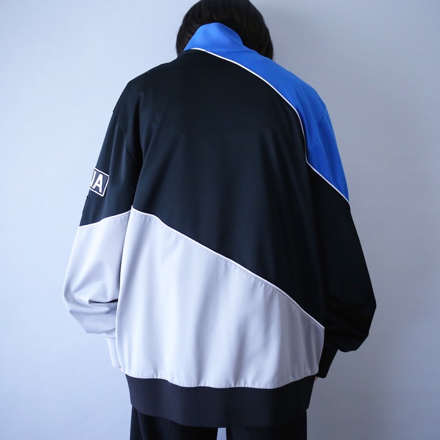 ”FILA" 3-tone switching and wappen design loose track jacket