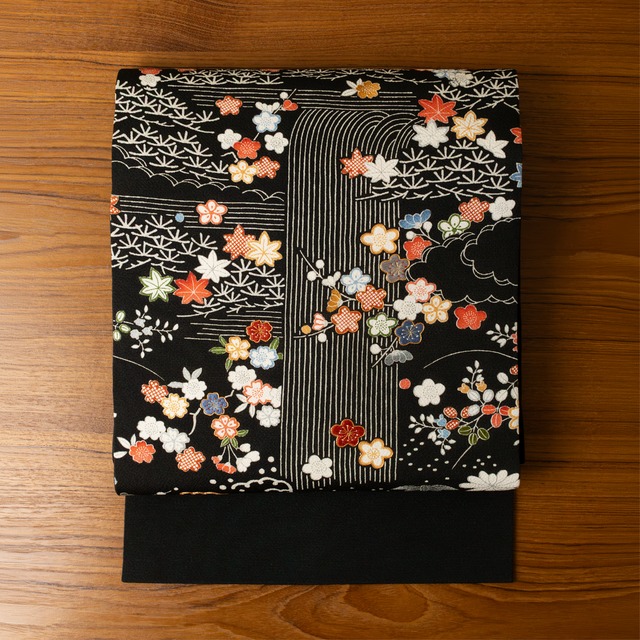 滝御所解の模様　刺繍　ちりめん地　名古屋帯　【中古品】