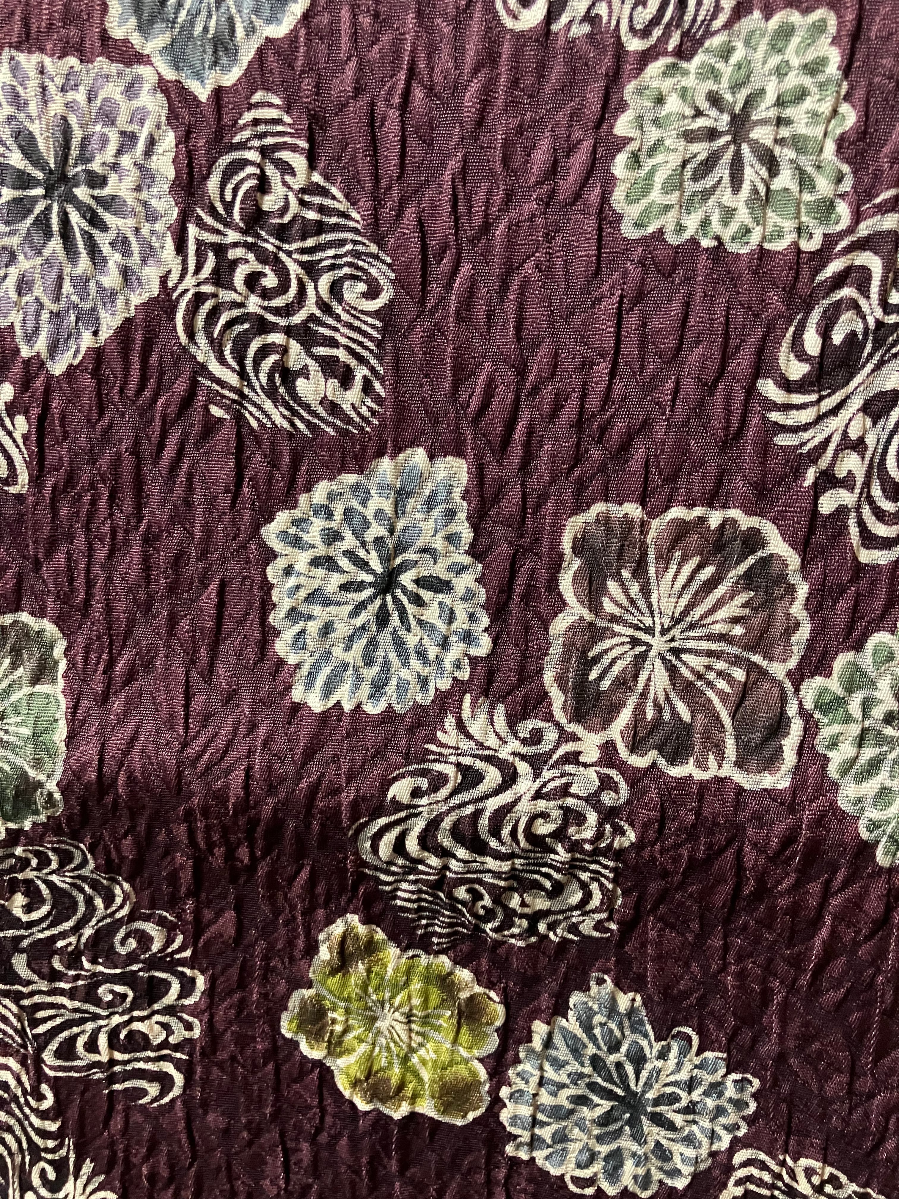 染め名古屋帯（黒紫ふくれ織地柄入六角花ちらし）