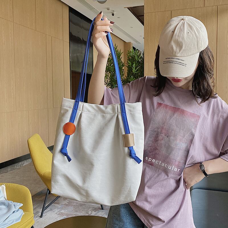 バッグレディースバッグ2020ニューウェーブワイルドファッション大容量ショルダーバッグ夏シンプルキャンバスポータブルトートバッグ Tiancai_Wing_Bag5919689