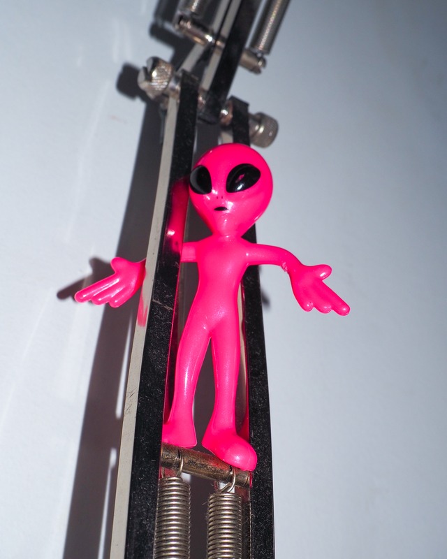 Pink gray type alien toy