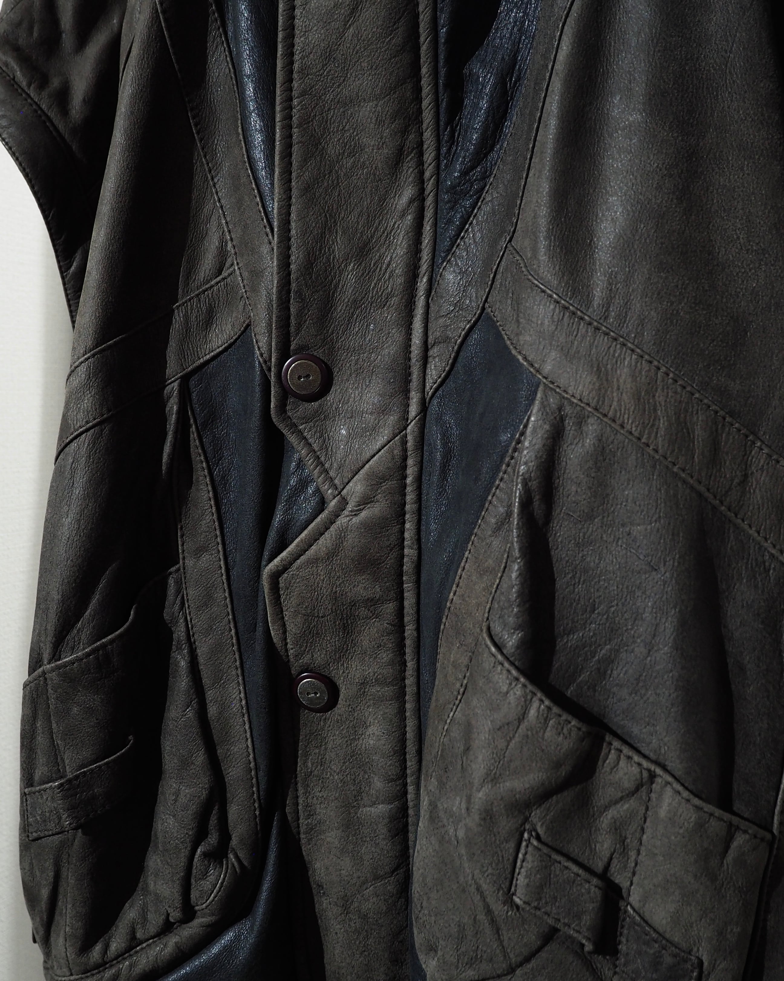 " 変形 × 分離 " Sleeve Detachable Gimmick × Panel Switching Vintage Loose Leather Jacket