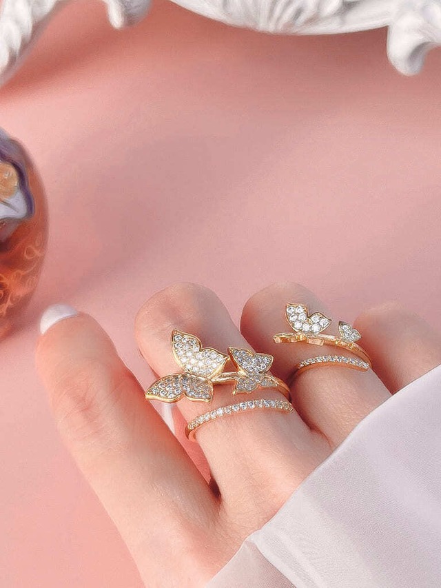 2 Crystal Butterfly line ring (s)