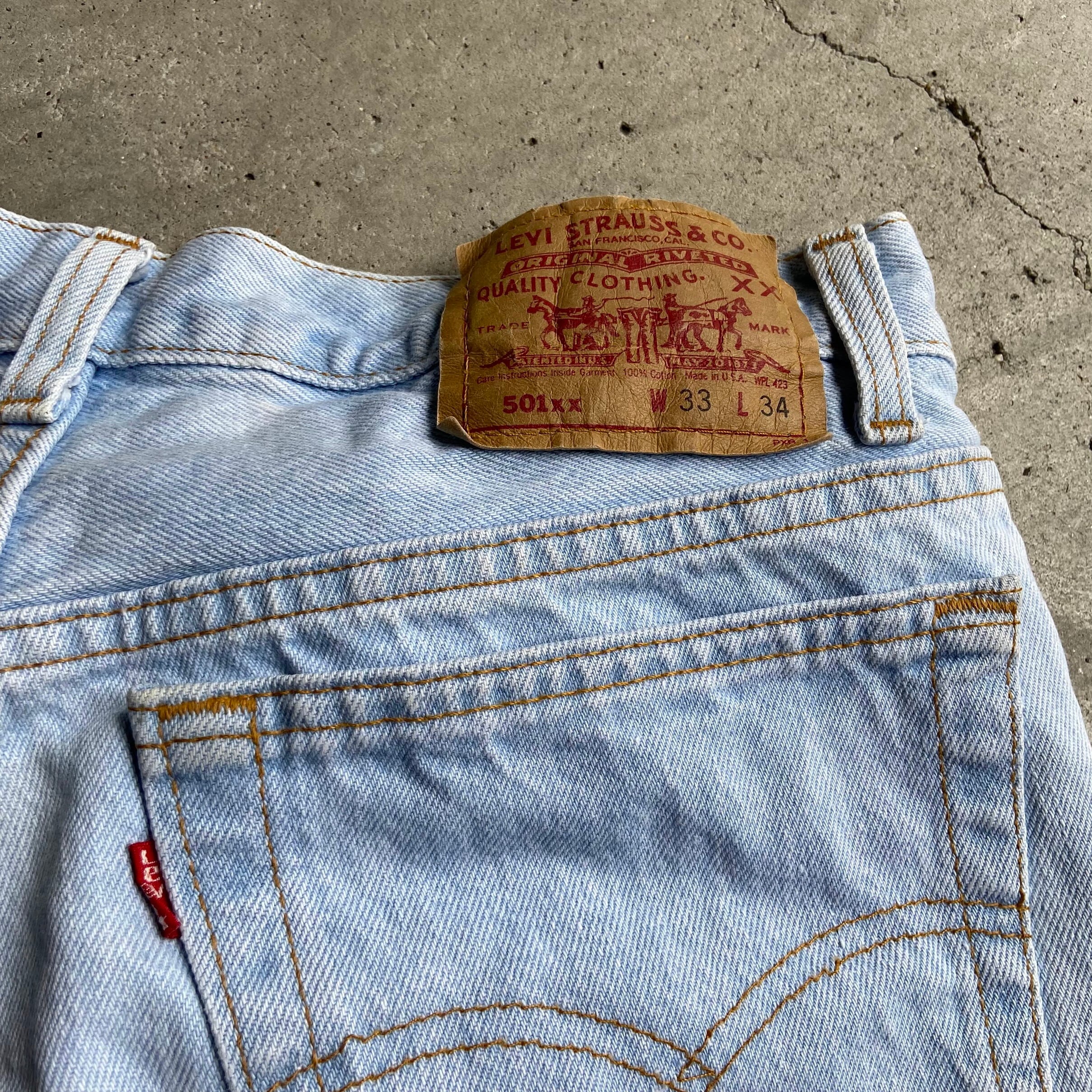 90s Levi's 501 w33 USA製 ストレート ダメージ 青 古着-