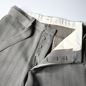 INTÉRIM / STRUCTURED DIAGONAL MELANGE WOOL DEADSTOCK BELTED MIL BAGGY TROUSER