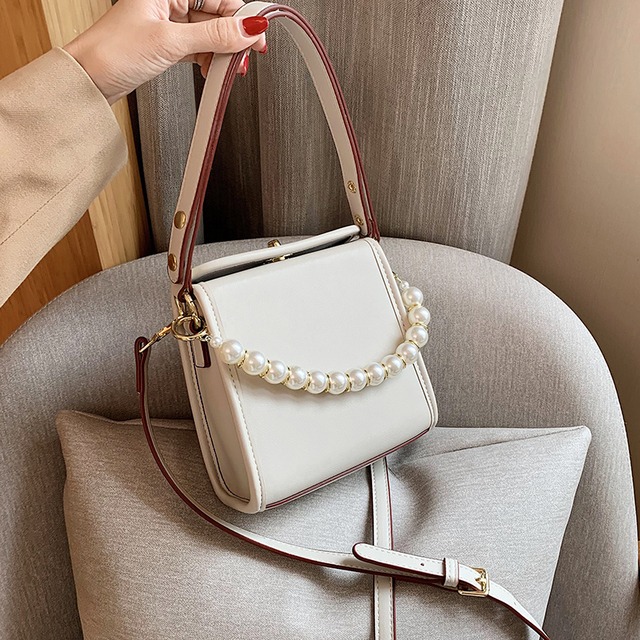 シンプルなワンショルダースモールバッグレディース2020人気の新しいトレンディなファッションオールマッチハンドバッグネットレッドエインスタイルハンドバッグ Tiancai_Wing_Bag9922177