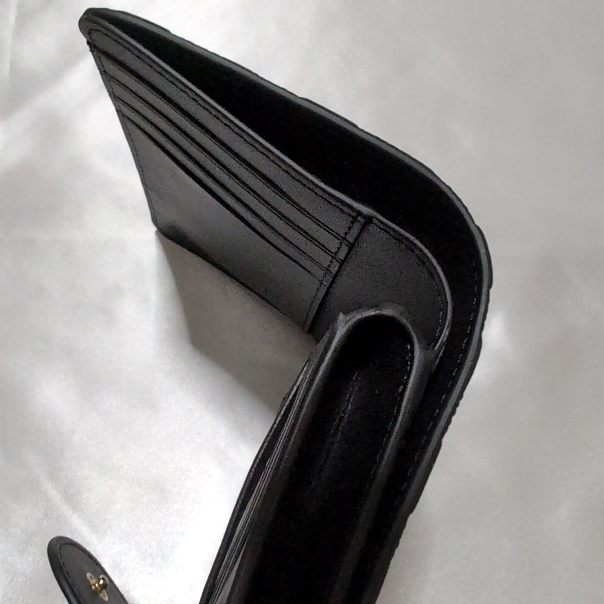 COACH ブラック エンボス 二つ折り財布 COACHコーチ 二つ折り財布 シグネチャーエンボス ブラック