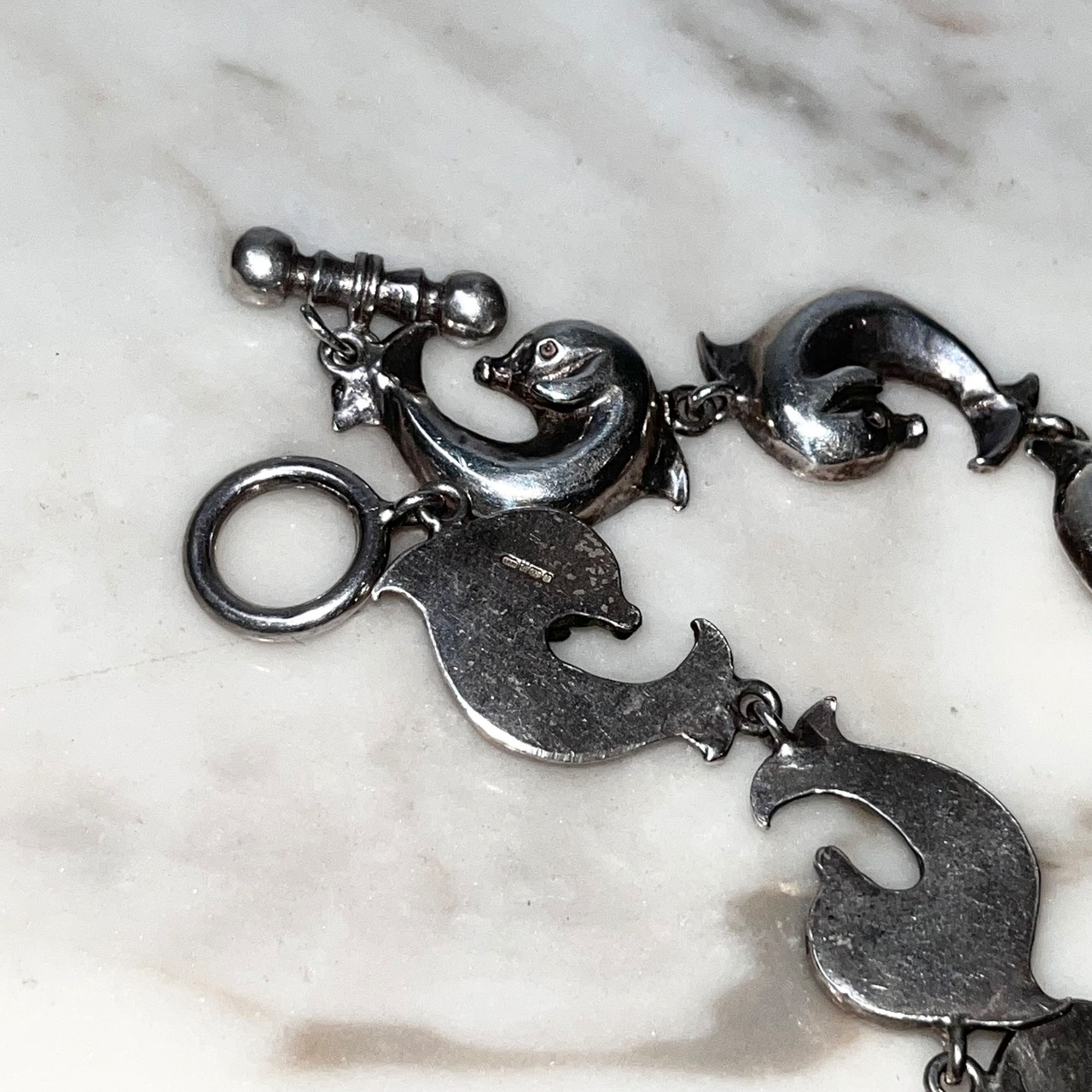 vintage silver dolphin bracelet with toggle