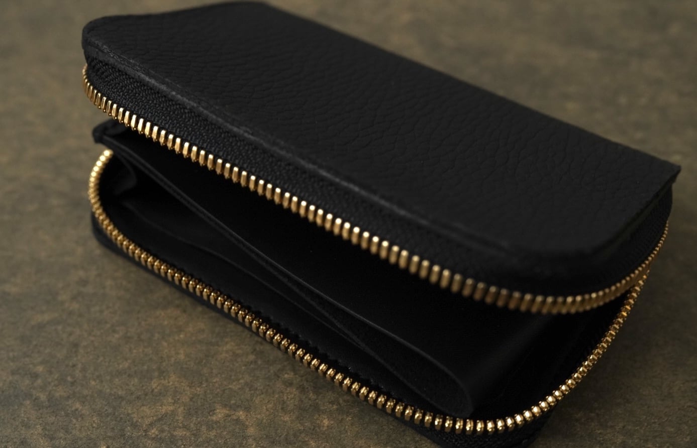 NAGI round zip wallet MID トリヨンクレマンス ブラック | una