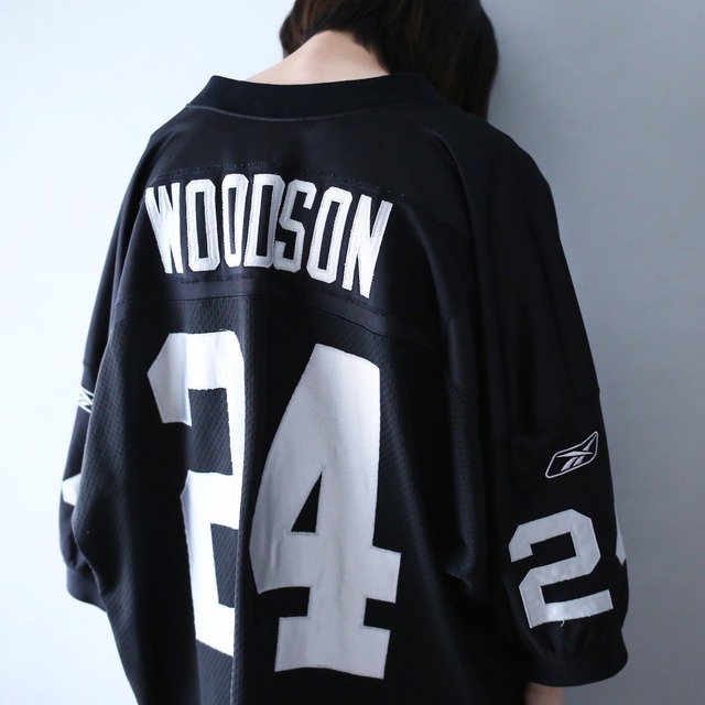 "Reebok×NFL" 24 numbering over silhouette black game shirt