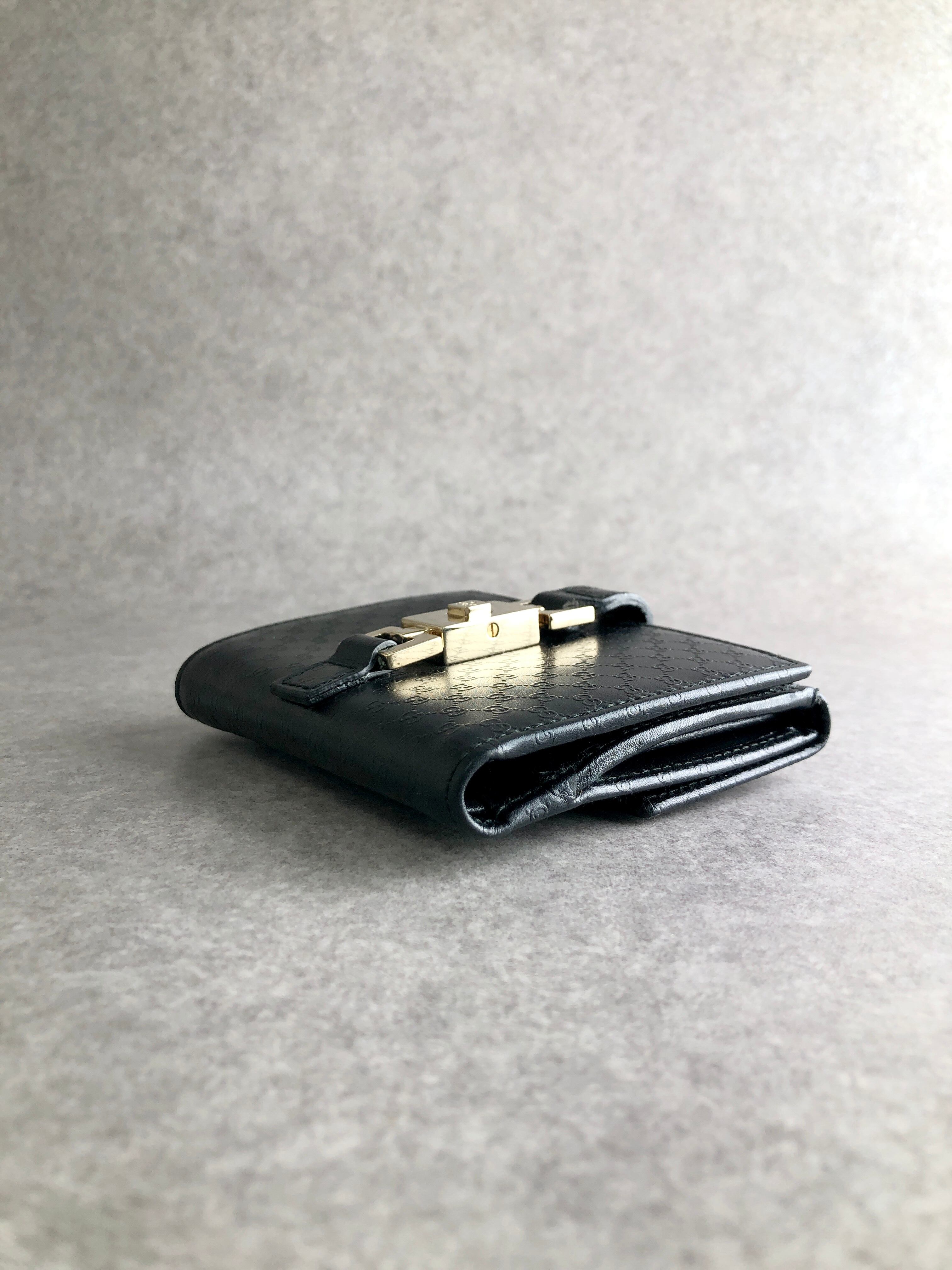 GUCCI グッチ ジャッキー 財布 ブラック GG柄 ロゴ レザー 2つ折り