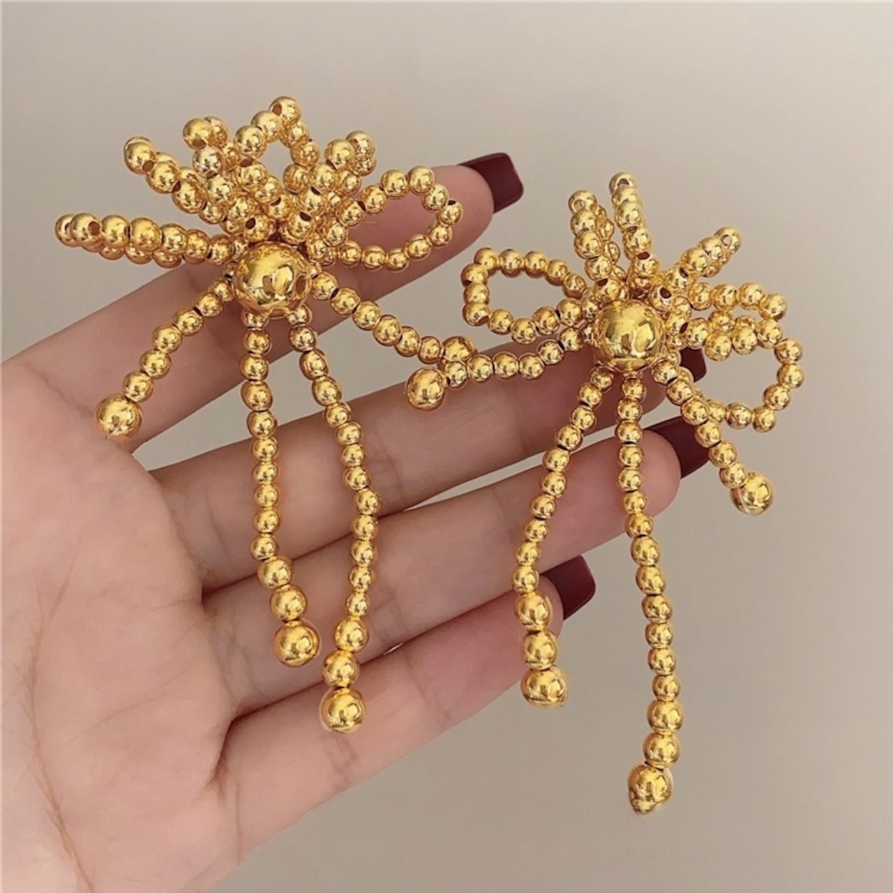 ゴールド ビーズリボン ピアス 90024