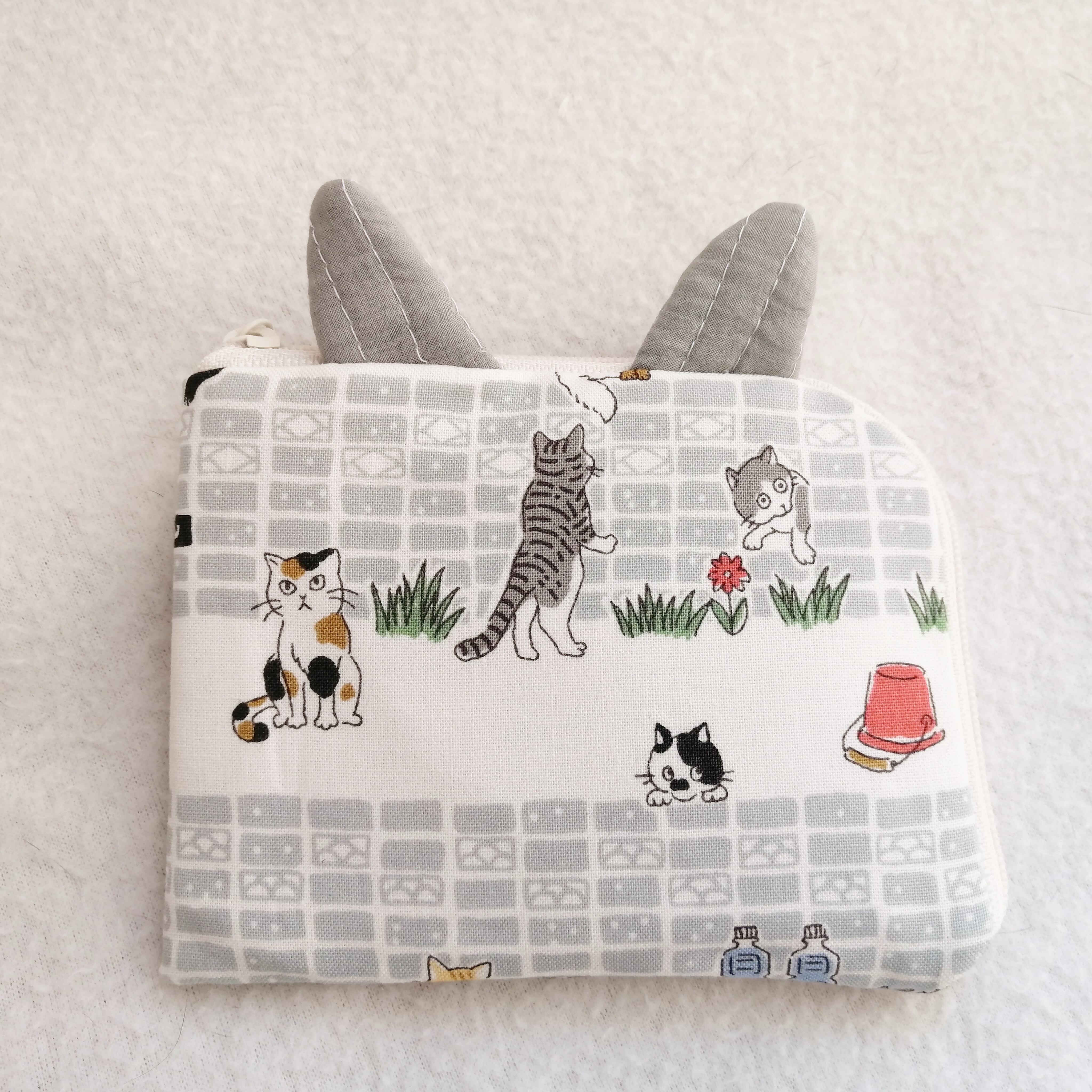 にゃんすけのL字ファスナーミニ財布 飛行機みみ