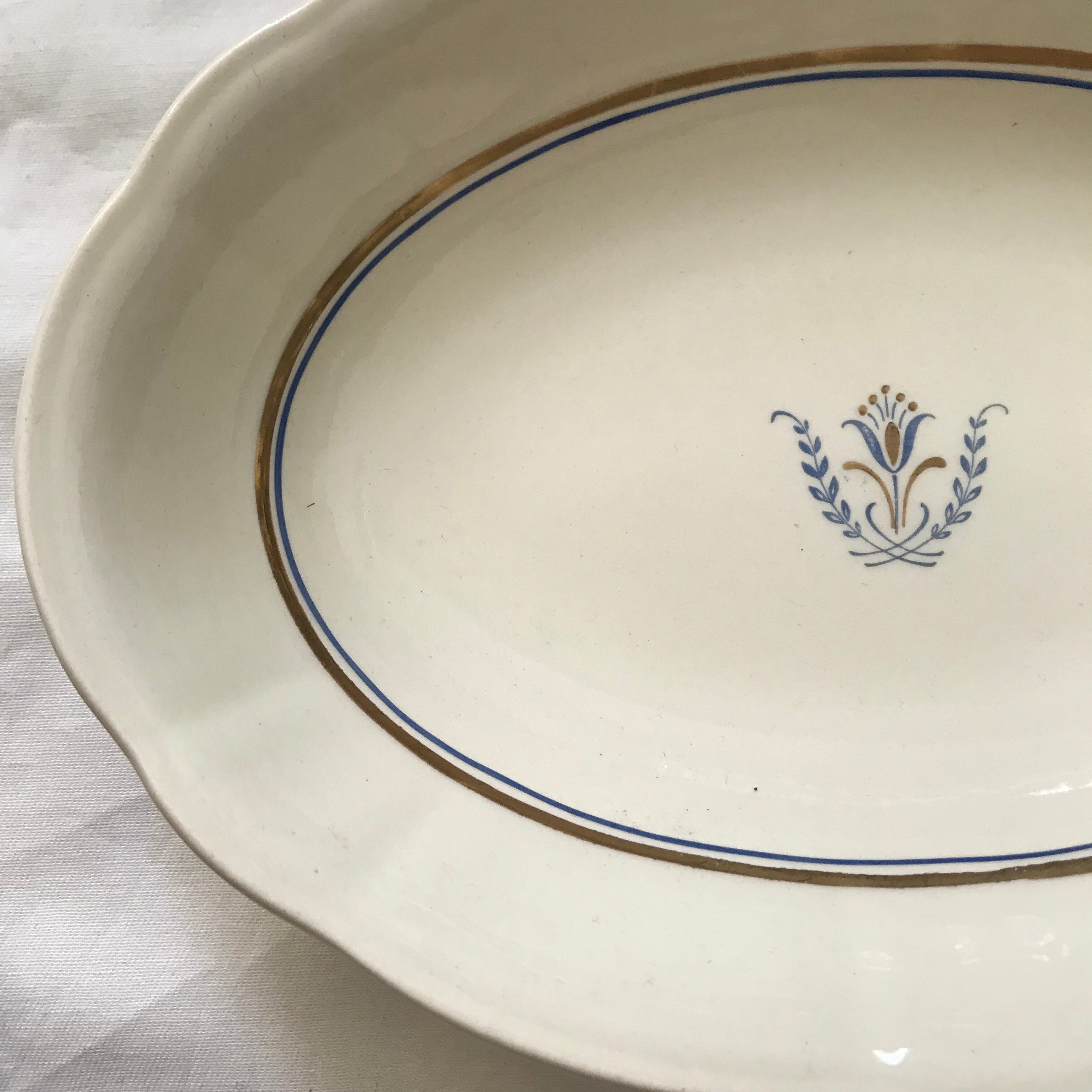 金と青の模様の深めのオーバル