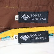 フラメンコ 衣装 SONIA JOHNES ソニアジョーンズ ツーピース セットアップ 上下セット オレンジ系 ブラウン系 ブラック系 イエロー系 ホワイト系 オレンジ 茶色 黄色 カラフル ボランテ フリル ダンス チャレコ 水玉 レース 豪華