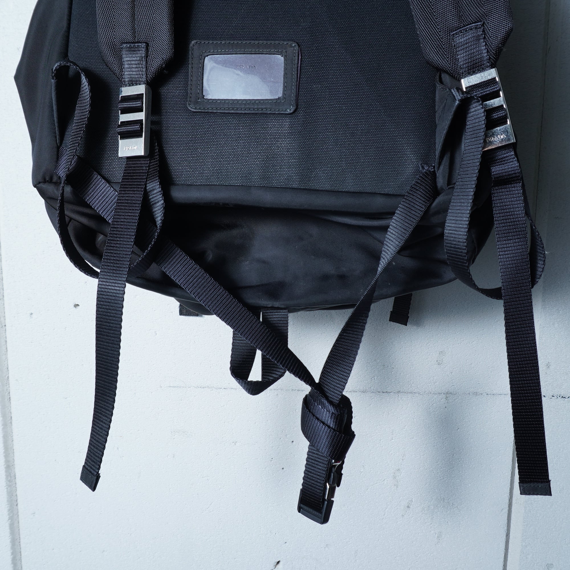 PRADA】プラダ ”V136”三角プレートロゴバックパックNERO black | MIXHIVE