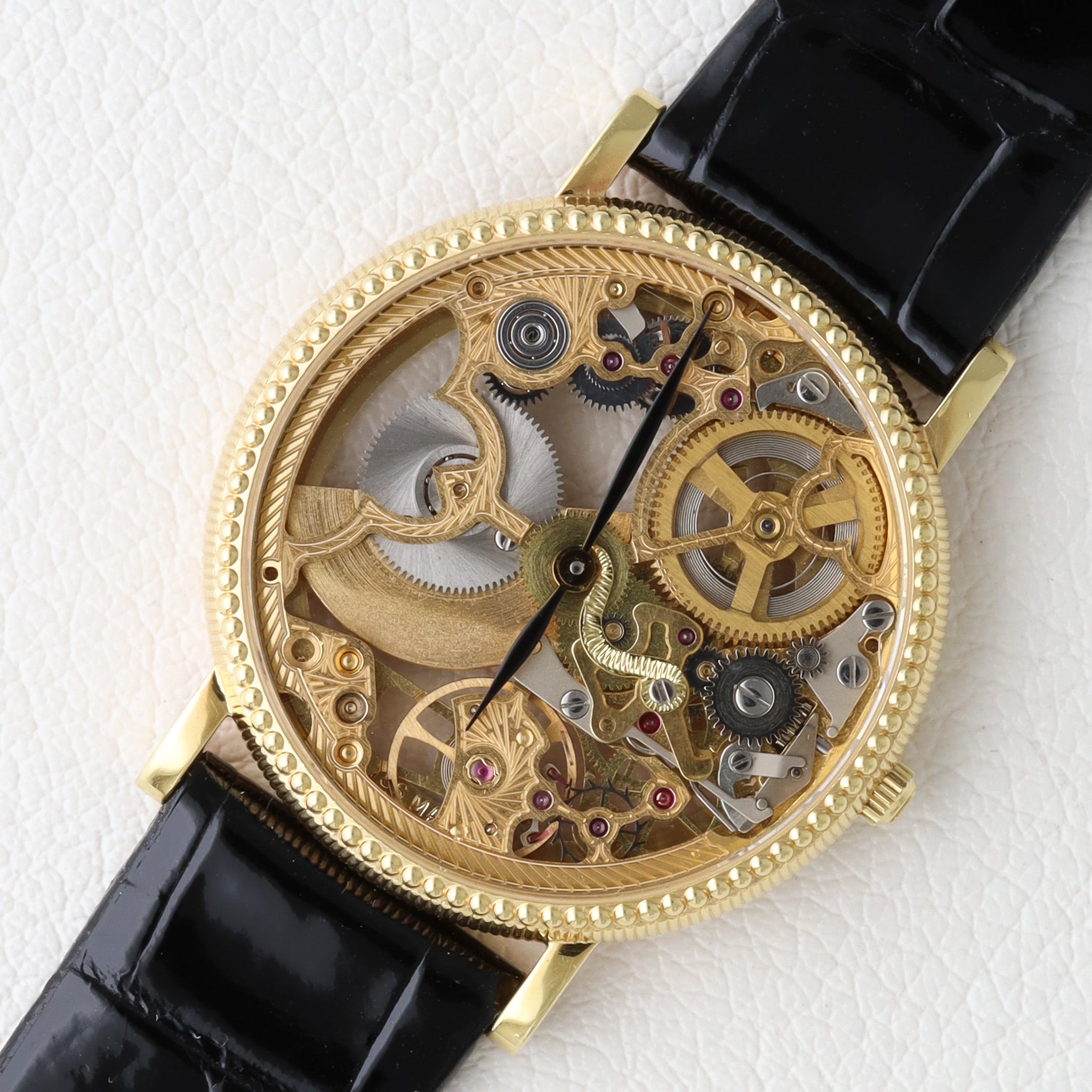 UNIVERSAL GENEVE スケルトン 18kYG 自動巻き マイクロローター 151.11