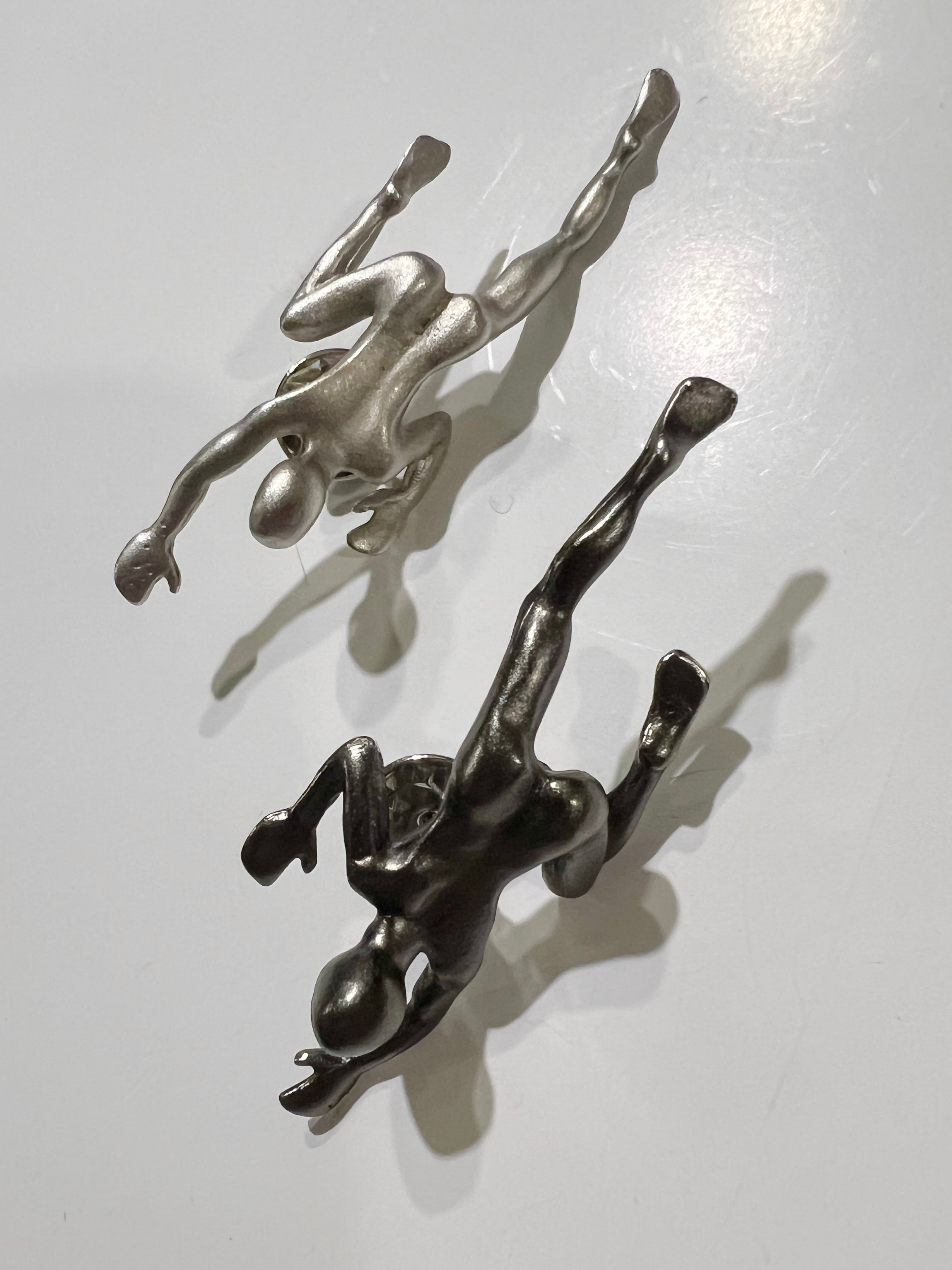 80s-90s metallic human brooch