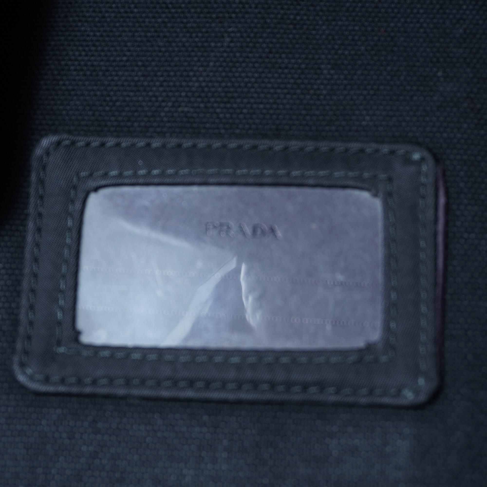 PRADA】プラダ ”V136”三角プレートロゴバックパックNERO black | MIXHIVE