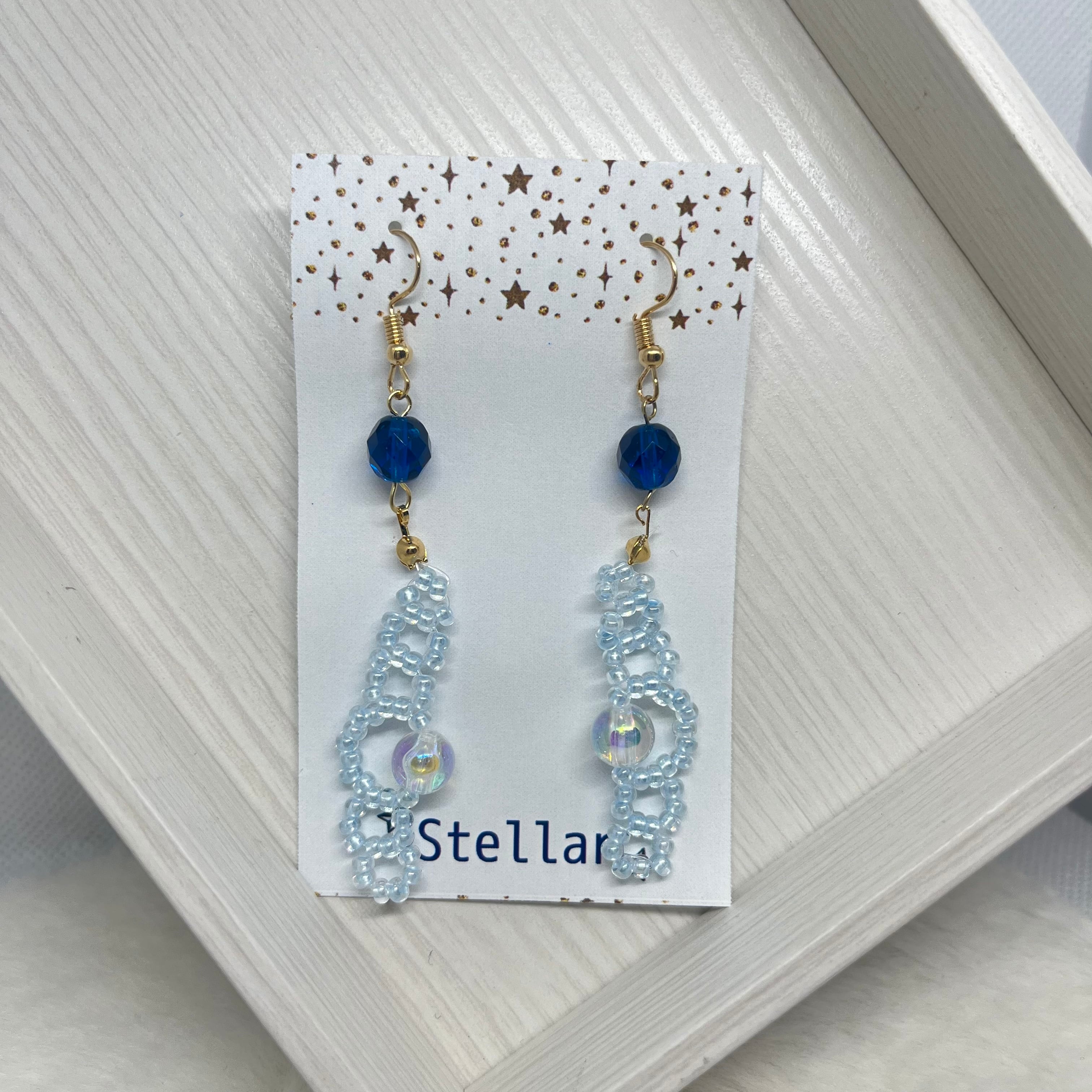 SOLD◆ ハンドメイド ピアス チェコビーズ ガラス 太陽 水色 クリア 青×水色ビーズピアス/イヤリング | stellar－揺れるハンドメイドピアス通販