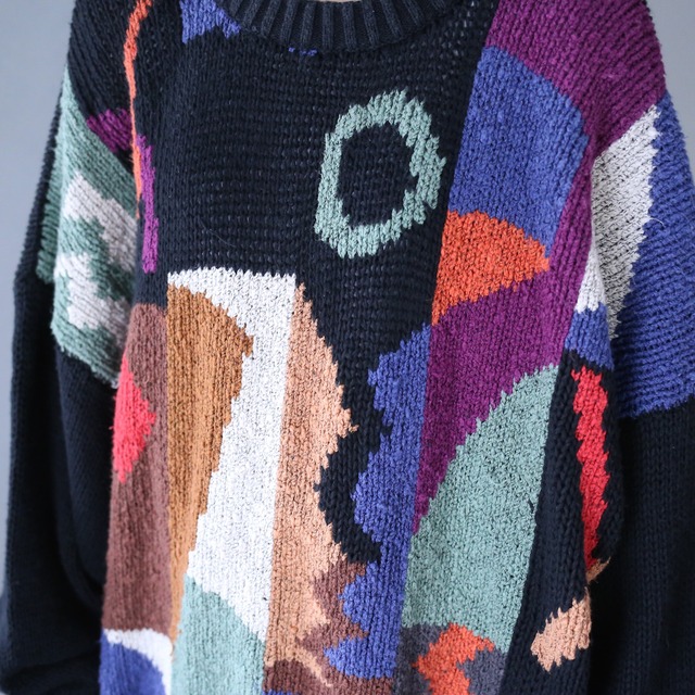 black base colorful art pattern over silhouette knit