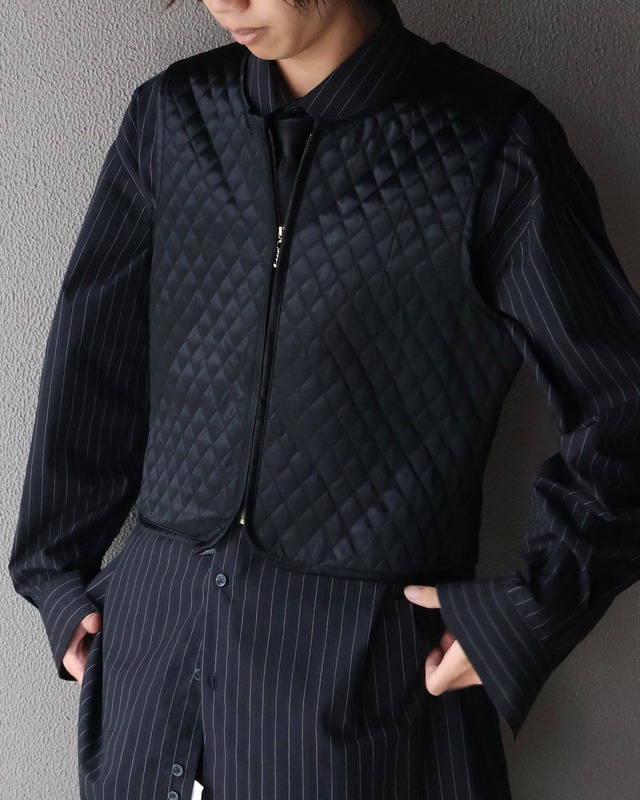 Quilted short length zip vest