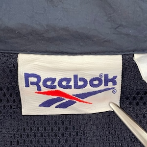 【Reebok】90s ナイロンジャケット 刺繍ロゴ ツートンカラー ワンポイントロゴ ジップアップ L相当 スポーツmix オールド ヴィンテージ リーボック 訳アリ US古着