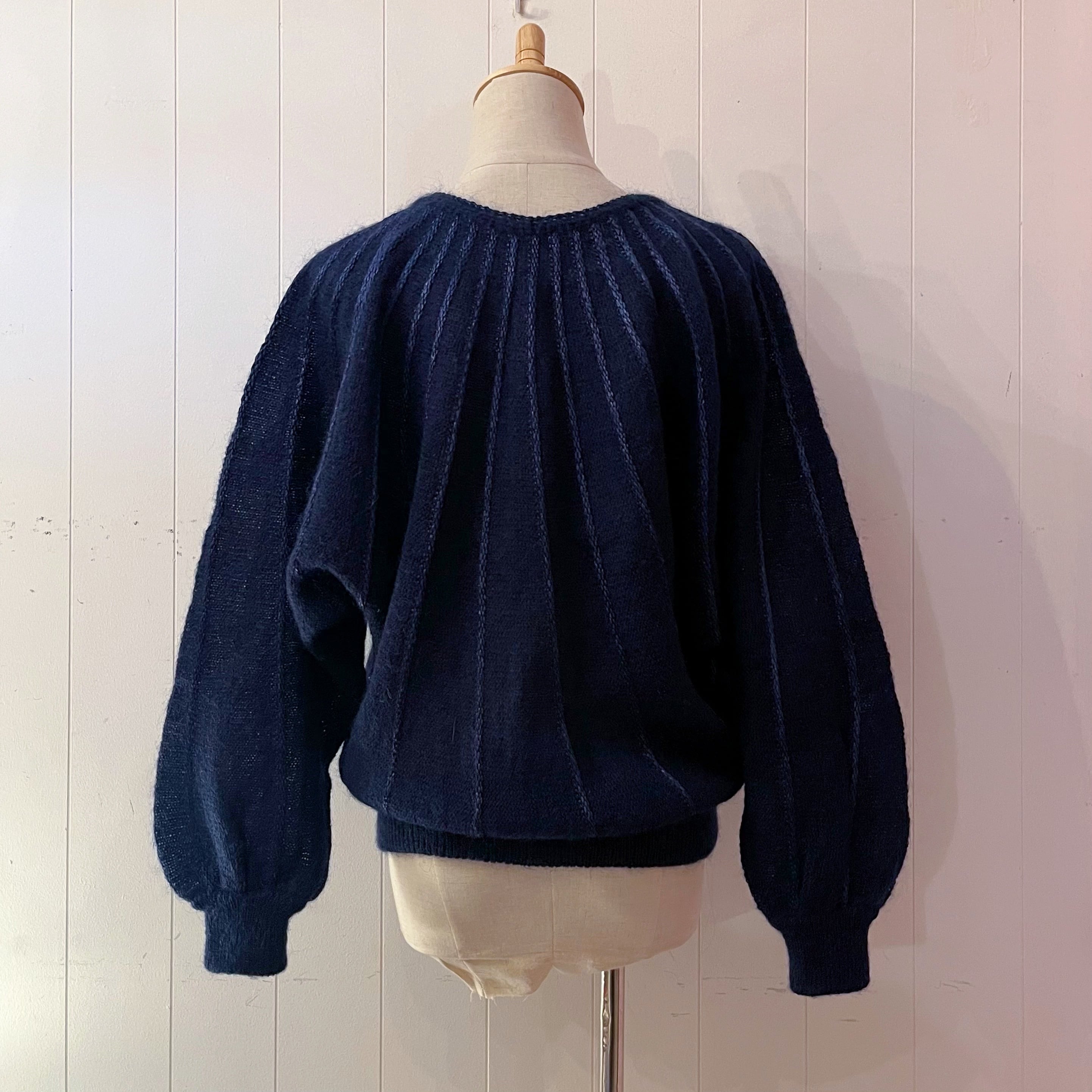 blue radial pattern knit sweater