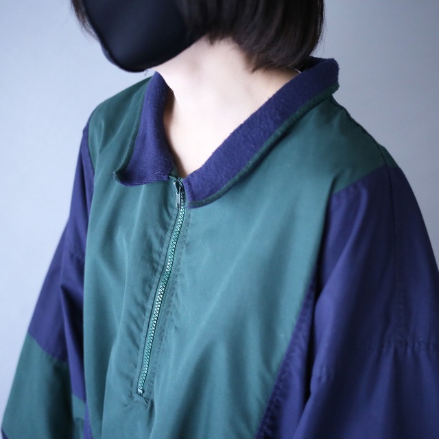 "Master Card" green × navy bi-color switching half-zip pullover