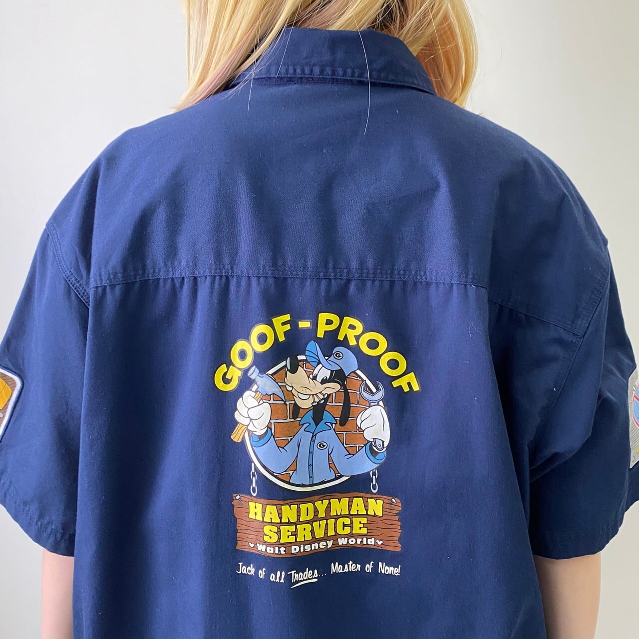 Disney ディズニー Goofy グーフィー バックプリント ワッペン ワークシャツ 半袖シャツ メンズl 古着 キャラクター ネイビー 紺色 半袖 シャツ Cave 古着屋 公式 古着通販サイト