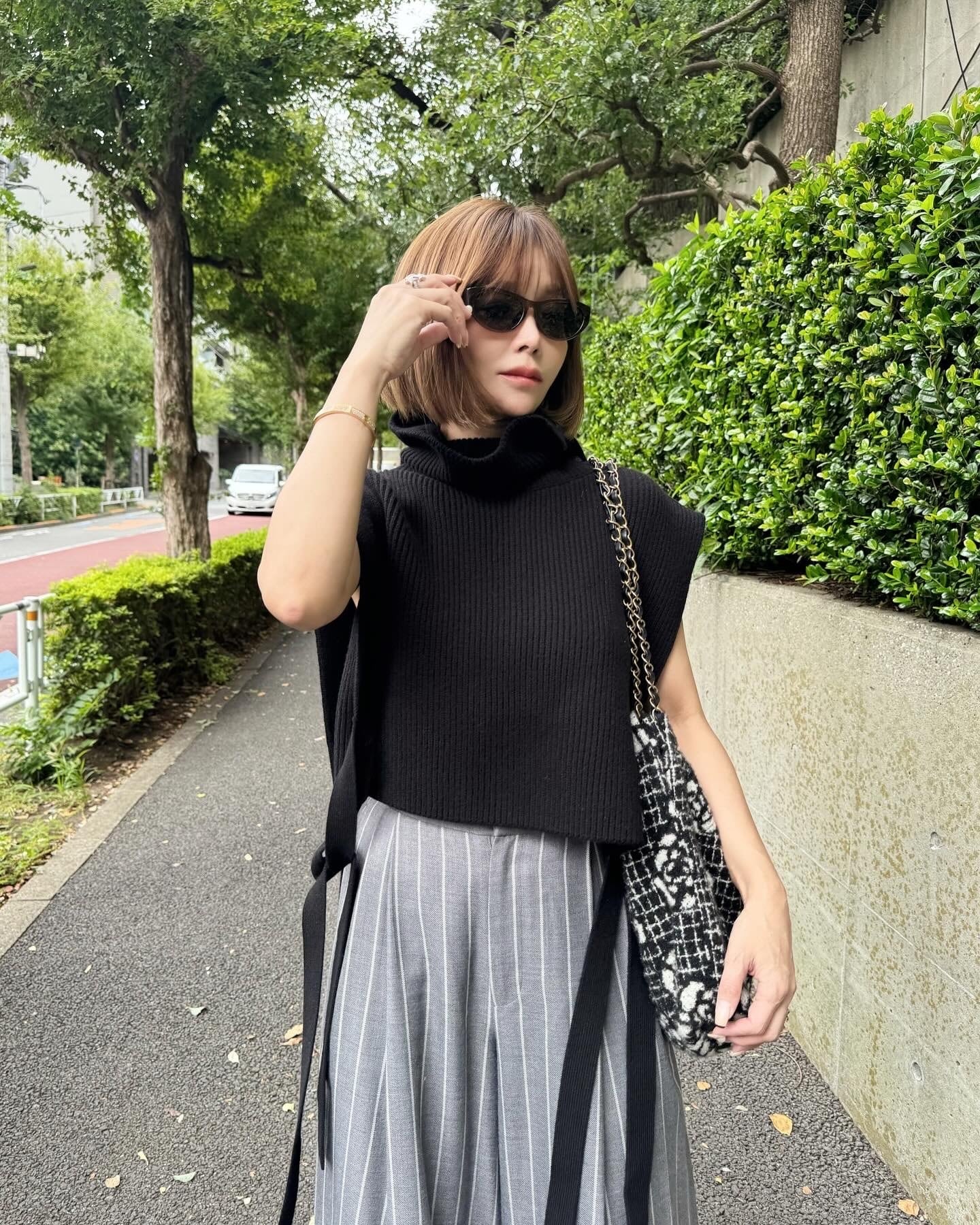 ノースリーブボタンダウンニット charre ブラック | Cygne 