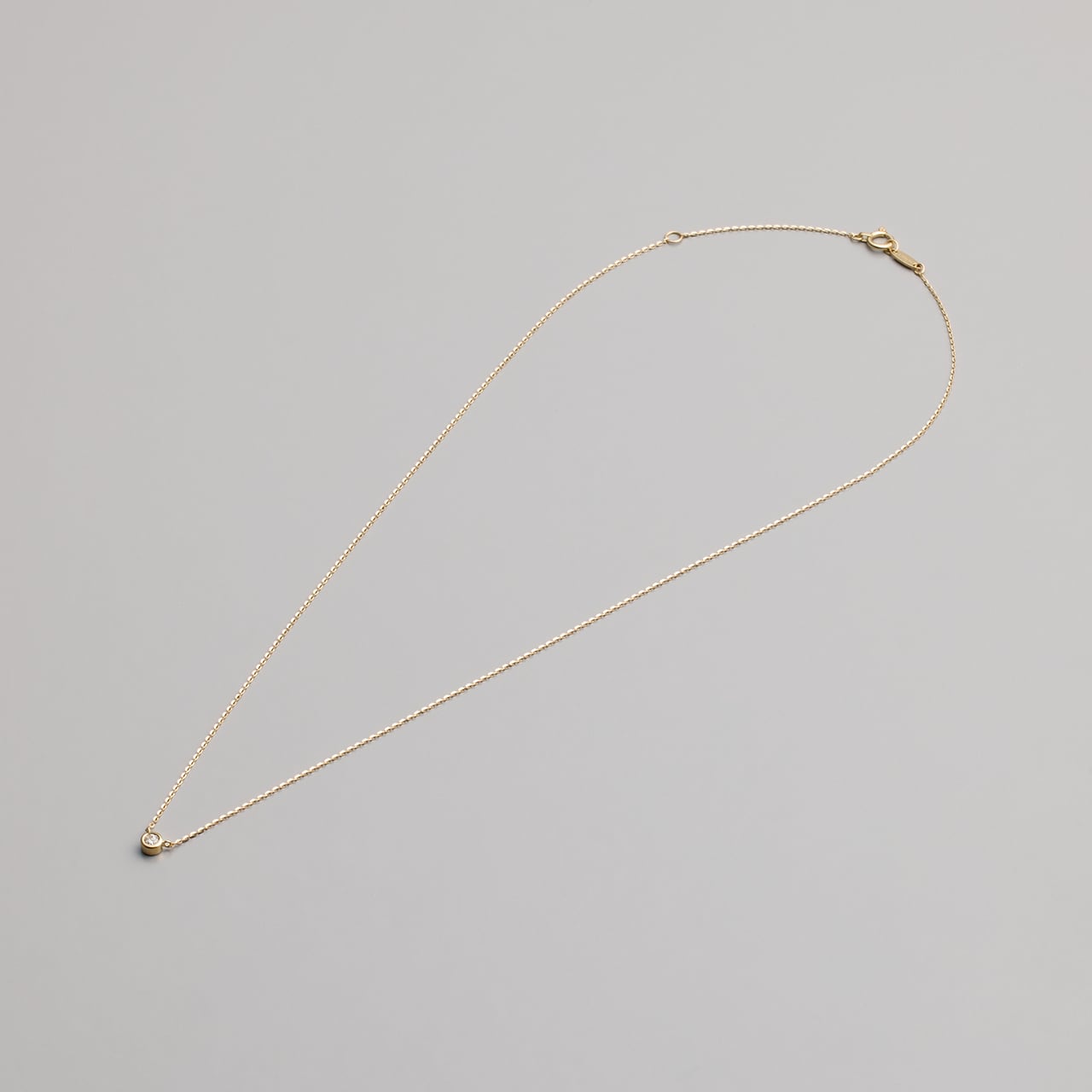 18K0.06プチダイヤネックレス レデッサンドゥデュー61 6本爪 一粒ダイヤモンド ネックレス 18金/les