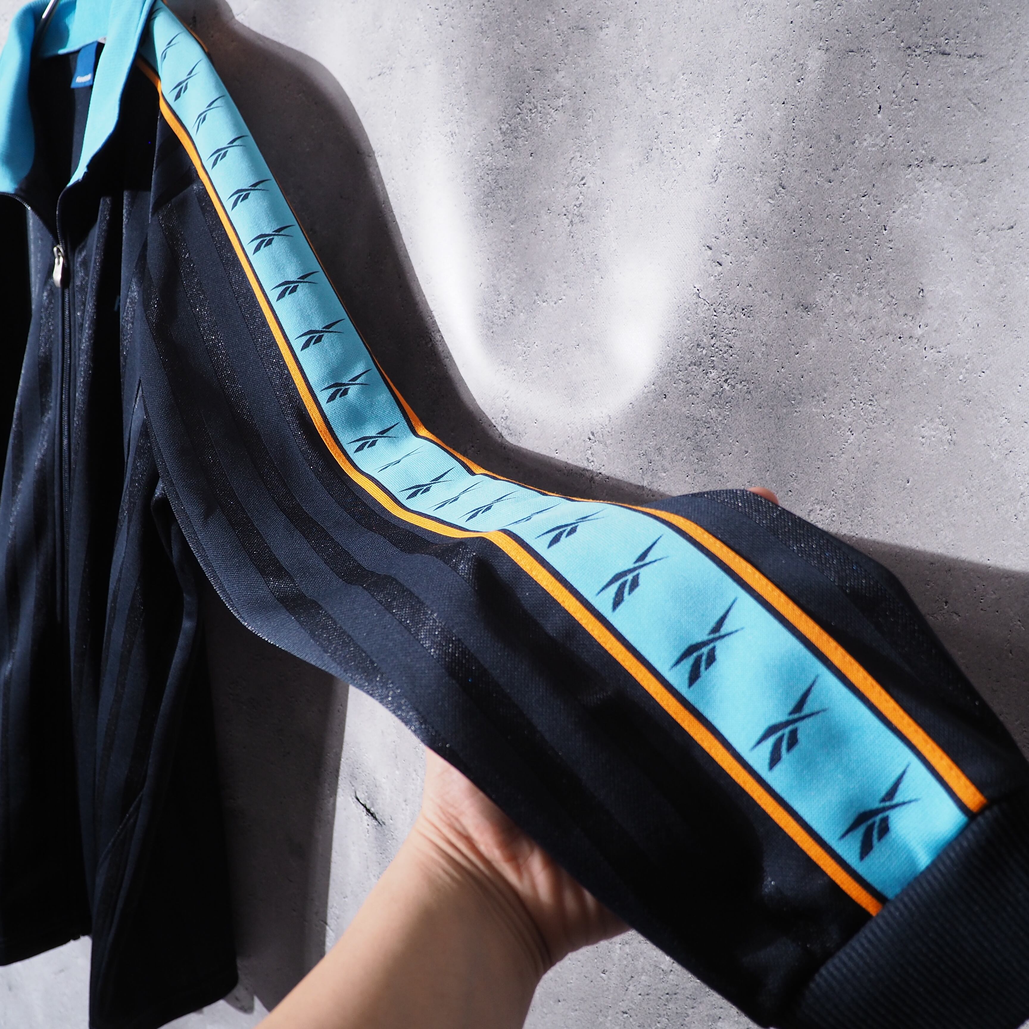 ” Reebok ” Good color line logo printed loose track jacket