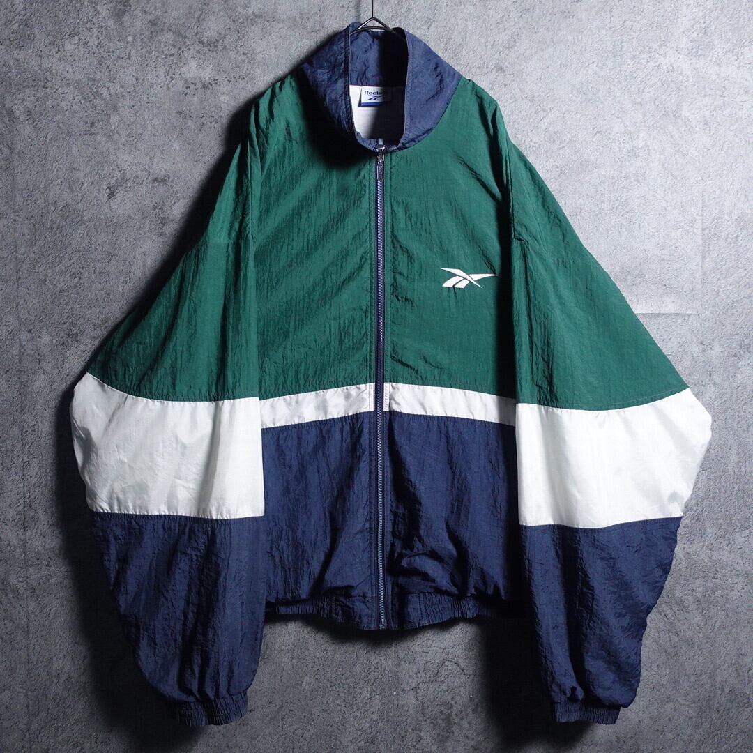 90s “Reebok” Multicolor Embroidered Design Nylon Jacket