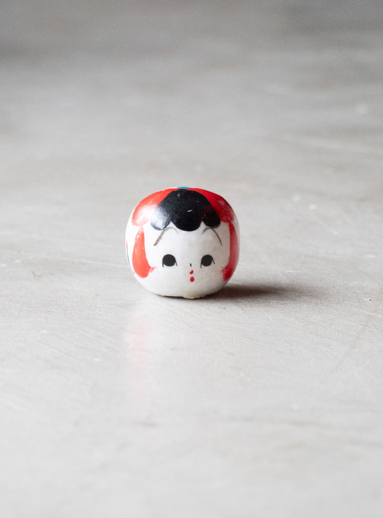 unknown 1970s Stone Kokeshi doll head