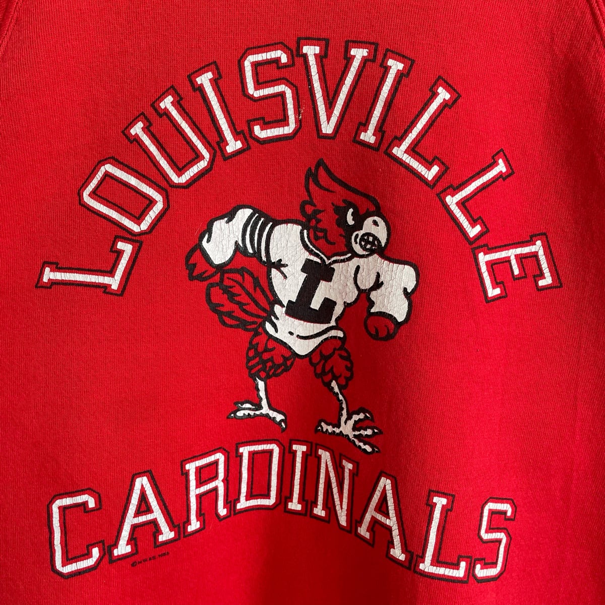 80s LOUISVILLE CARDINALS カレッジロゴ スウェット 赤 レッド 古着 トレーナー チームスウェット カレッジスウェット  カレッジ カージナルス ラグラン ヴィンテージ ビンテージ 80年代 USA製 プリント 裏起毛 メンズ L 23030204